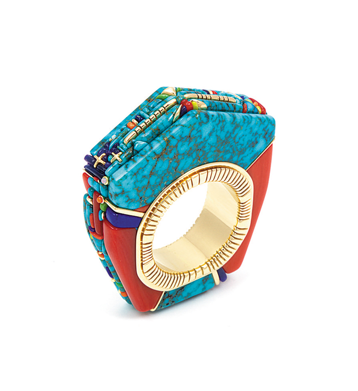 Ring by Raymond Yazzie is made from two types of native turquoise, opal and sugilite and set in 14-karat gold.