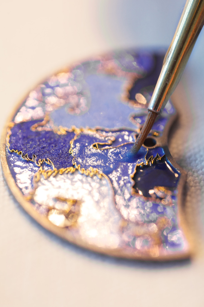 Painting enamel dials is a time consuming process. 