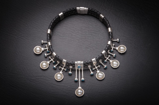 Leslie Herbert’s Fitzpatrick collar of black braided leather with mabe pearls and blue topaz set in sterling silver.