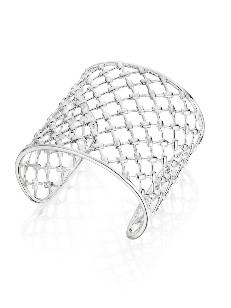 Thistle & Bee’s bold sterling silver Veneta cuff with a crosshatched design. 