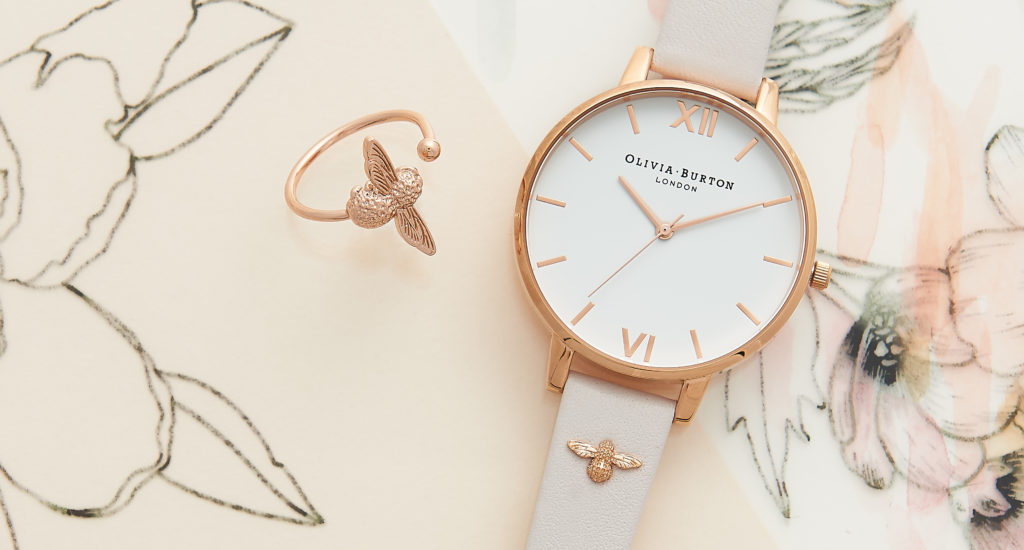 Three-dimensional embellished watch strap with bee motif on this Olivia Burton watch.